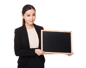 Asian Young businesswoman show with blackboard