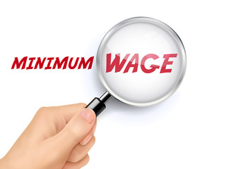 minimum wage words showing through magnifying glass