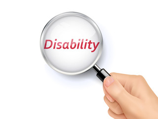 disability word showing through magnifying glass