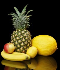 Collection of yellow fruits on black