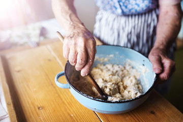 Senior woman baking 