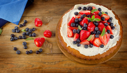 Cake with berries and mint.
