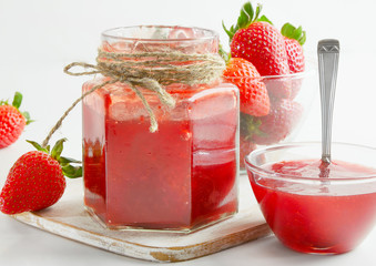 strawberries marmalade on a wooden table