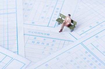 サラリーマンと給与明細