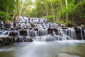 Fototapeten Beautiful deep forest waterfall at Sam lan waterfall National Park Saraburi Thailand © powerbeephoto