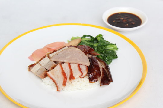 BBQ Pork, Duck and Crispy Pork with Rice