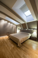 Interior of a specious luxury bedroom in the loft