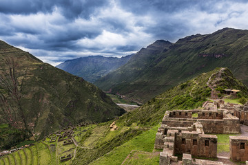 View of the Sacred Valley and ancient Inca terraces in Pisac, Peru.
