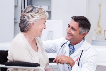 Fototapeta premium Composite image of pink awareness ribbon