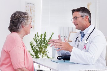 Fototapeta premium Composite image of pink awareness ribbon