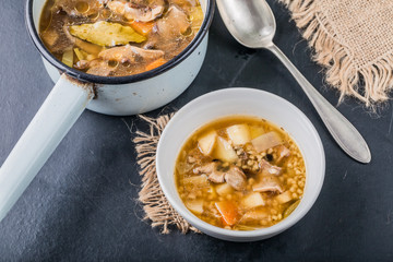 Traditional Polish soup with forest mushrooms