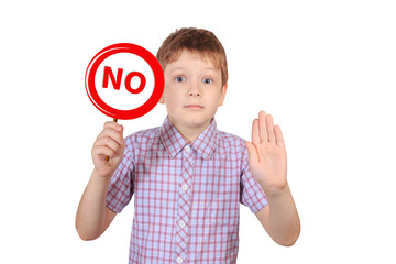 Child with a sign prohibiting smoking, the concept of 