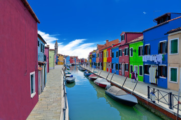 Fototapeta na wymiar Venice landmark, Burano island, colorful houses and boats, Venice, Italy