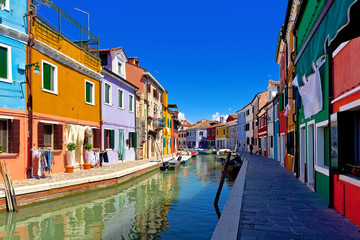 Fototapeta na wymiar Venice landmark, Burano island, colorful houses and boats, Venice, Italy