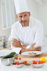 Chef cooking in dosmetic kitchen