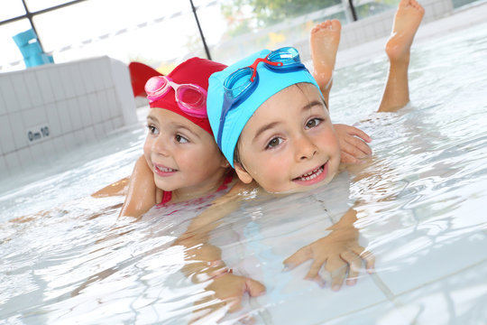 Kids having fun at the swimming pool