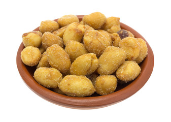 Bowl of salted caramel coated peanuts