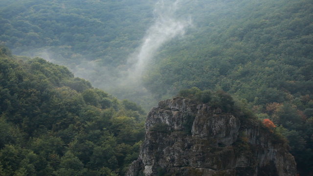 mooving white mist in mountains