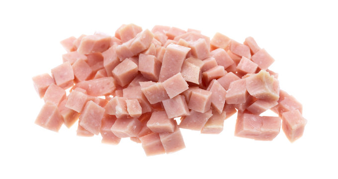 Diced ham on a white background