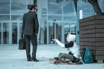 Business man is disgusted at the sight of a homeless - caucasian people - business, people, poverty...