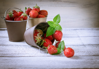Strawberry in a bucket.
