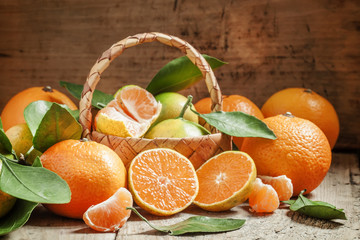 Cut ripe juicy orange tangerines, selective focus