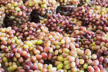 Fresh grapes on the table at the market