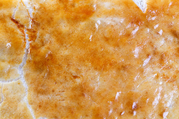 Extreme closeup of a sweet sponge cake.