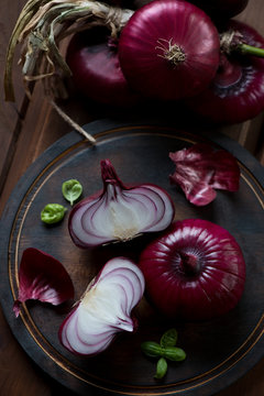 Still life with red onion. Studio shot, selective focus