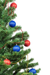 Christmas tree decorated with blue and red balls.