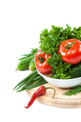 Fresh vegetables on a white background.