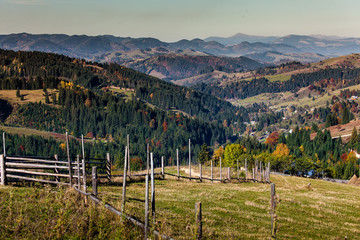 Fototapeta na wymiar Small village in autumn Carpathian mountains