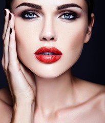 sensual glamour portrait of beautiful  woman model lady with fresh daily makeup with red lips color and clean healthy skin face