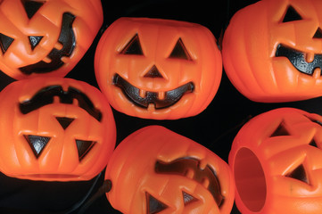 Plastic pumpkins texture background