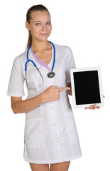 Woman doctor holding a tablet showing forefinger on the screen.