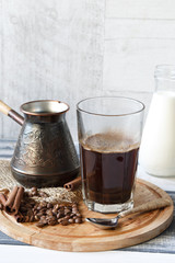 cup of coffee with cinnamon. Coffee prepared in the cezve