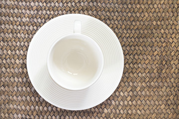 coffee cup top view on bamboo basketwork