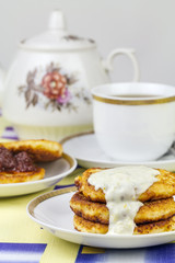 Cheesecakes with sauce.