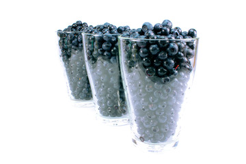 Three full glass of ripe blueberries