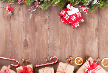 Christmas background with fir tree and gift boxes