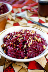 Fresh beet salad with garlic and walnuts