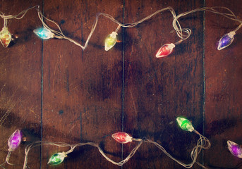 Christmas light on the wooden background