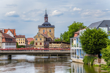 Fototapeta na wymiar Bamberg. A scenic view of the Regnitz river from the Old Town Hall, bridges and old buildings on artificial islands