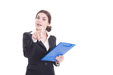 Woman supervisor or inspector holding clipboard pointing finger