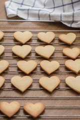 Heart shaped valentine's butter cookies cooling on the rack