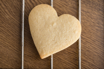 Heart shaped valentine's butter cookies cooling on the rack