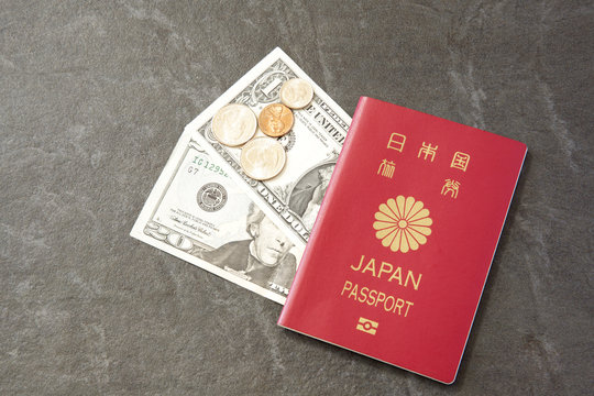 Japanese Passport and US currency