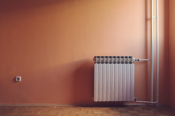 Pastel retro color of warm windows natural illuminated empty room with radiator