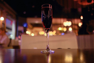 glass of wine restaurant interior serving dinner