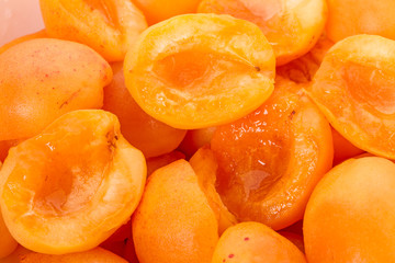 Background of ripe apricot halves